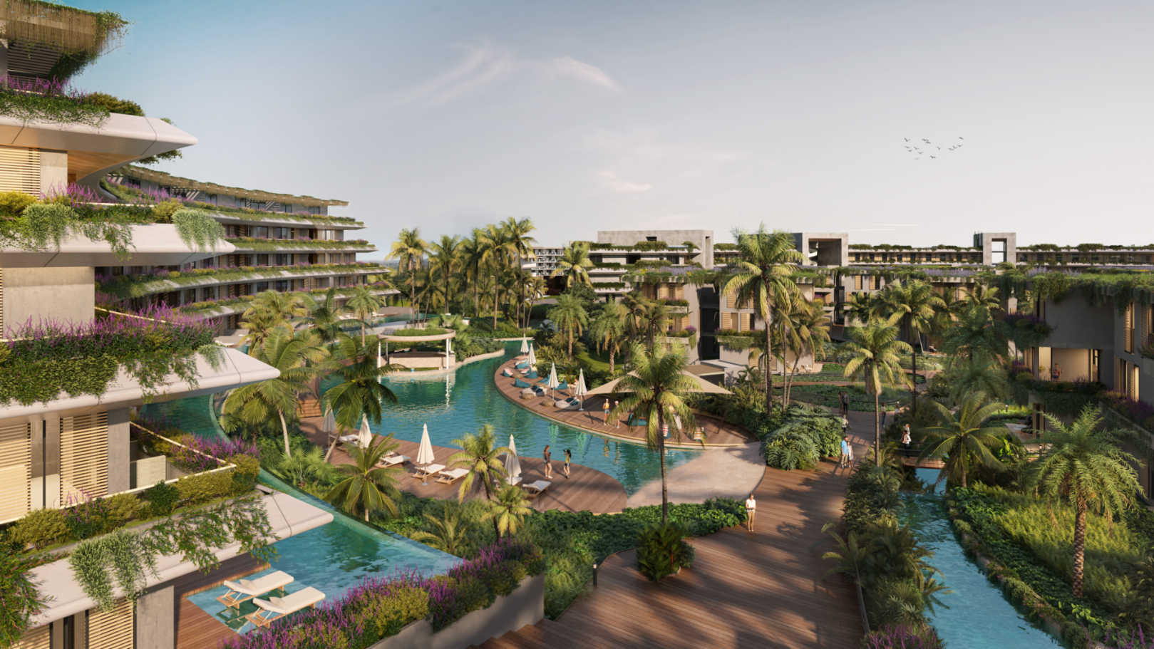 Moderne Wohnanlage mit tropischen Gärten und Poollandschaft.